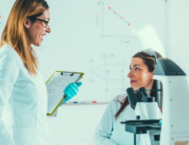 Scientists working in their lab